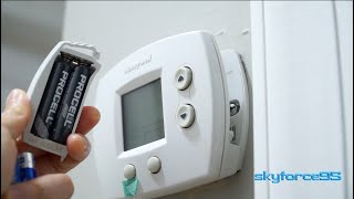 How to Replace the Batteries in a Honeywell Thermostat [upl. by Tiraj672]