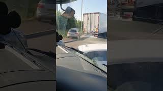 HOW TO GET OUT OF A BAD TRAFFIC JAM VERY ILLEGAL DRIVING BY CAR DRIVER [upl. by Tortosa]