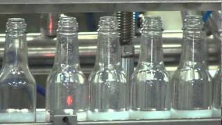 Pressure Overflow filler working with Glass Bottles by Acasi Machinery [upl. by Rieth]