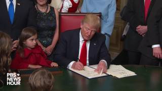 Trump signs first official documents as US president [upl. by Junia]