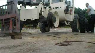 Changing a tire on a forklift [upl. by Gil]