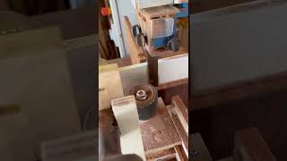 A board from quotThe Treequot quilted mahogany being resawn with a Little Proteus power feeder [upl. by Rorie]