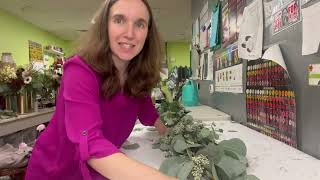 Florist shows how to make a simple eucalyptus garland with flowers for a wedding [upl. by Eelta]