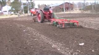 Belarus MTZ2 harrowing [upl. by Mahgem]