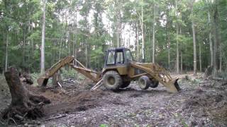 Case 580C Backhoe  Digging out three big stumps  Part 2 HD [upl. by Schrader231]