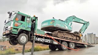 Moving Kobelco SK200 Excavator By Fuso Self Loader Truck [upl. by Adler]