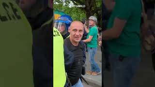 Farright protesters clash with British police in Bristol [upl. by Ahsiuqal]