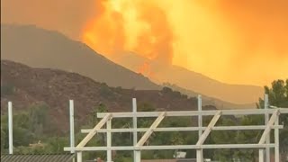 Dramatic footage of Airport Fire rapidly progressing down the mountain  WooGlobe [upl. by Duane539]