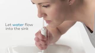 How to Use a Waterpik™ Water Flosser [upl. by Aehcim]