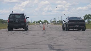 800 HP Tahoe RST vs 707 HP Hellcat Challenger Widebody [upl. by Anilorak]