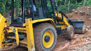 jcb 3dx transporting soil and levelling land [upl. by Attekal]