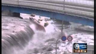 Incredible video of tsunami wave hitting Japan town [upl. by Regor]