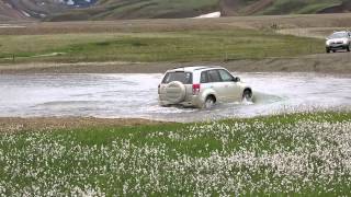 Small cars fording river near Landmannalaugar Iceland 2014 07 17 [upl. by Smaj]