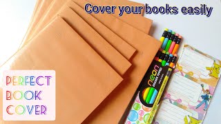 How to cover books perfectly  How to cover books with brown paper  Brown paper book covering [upl. by Llerreg]