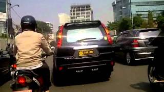 Indonesian police motorcycle and Nissan xtrail unmarked police car escort RI9 [upl. by Enivid435]