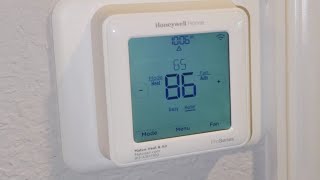 Honeywell Proseries Thermostat Battery Replacement [upl. by Nomaj]