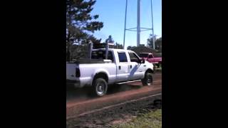 2000 F250 pulling  Iron Anchor Sled [upl. by Golub]