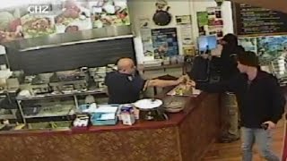 Watch Store Clerk Completely Ignore An Armed Robber To Help Customers [upl. by Netniuq]