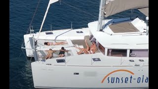 GW  We flew over yachts in Santorinis famous Black Beach  Stunning views  4K [upl. by Yelyah]