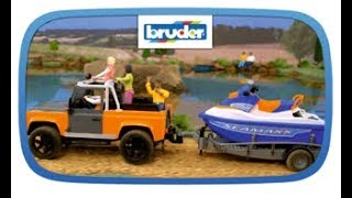 Land Rover Defender Pick Up mit Anhänger und Personal Water Craft  02599  Bruder Spielwaren [upl. by Enelcaj]