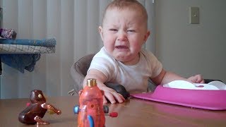 Baby is freaked out by monkey toy  Babies and Toddlers  KYOOT [upl. by Attennek]