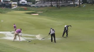 Preparing Hole 18 at the Travelers Championship after a rain storm [upl. by Giacinta863]