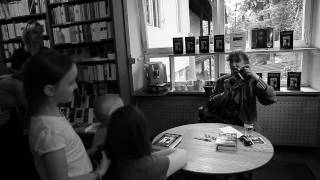 Patti Smith Shoots Her Polaroid Land Camera At Just Kids Book Signing [upl. by Mara109]