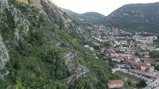 A stunning view of majestic mountains and a coastal town perfect for exploration and peace [upl. by Specht930]