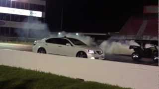 Lexus LS600hL VS Corvette quarter mile drag race Lexus 142 sec [upl. by Eillit]