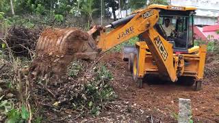 jcb 3dx cleaning and levelling land for making it suitable for construction purpose [upl. by Nnyleuqcaj894]