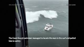 Huge wave capsizes boat as rookie US Coast Guard swimmer rescues man from ocean [upl. by Attezi]