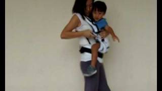 Manduca Baby Carrier Instructions  Switching from Side Carry to Front Carry Position [upl. by Najed466]