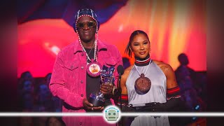 Flavor Flav Gifts Jordan Chiles DiamondEncrusted Stopwatch at 2024 VMAs [upl. by Anaiek]