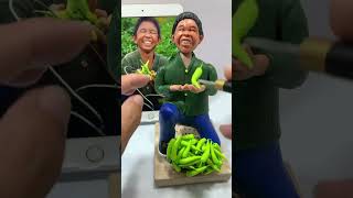 Old child picking peppers by hand production process clay figurines handmade old craftsmansh [upl. by Nosirrah]