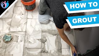 how to grout tile in a bathroom  sanded grout  bathroom remodel DIY [upl. by Aivataj]