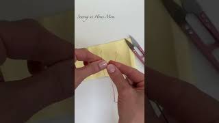 how to tie a knot in thread for sewing  easy needle sewing knot shorts [upl. by Ahsyas]