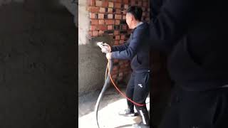 High pressure spray gun spraying process for cement mortar on interior walls [upl. by Schaumberger494]