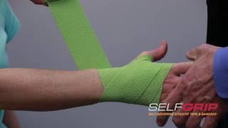 How to tape wrist injuries using SelfGrip®  demonstrated by Dr Overland [upl. by Cynthla]