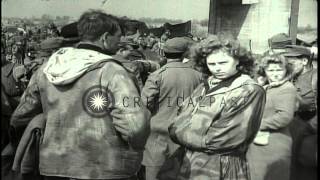 American soldiers rest after the battle at the Tangermunde bridge in Germany duriHD Stock Footage [upl. by Yduj]