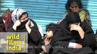 Shia women cry as the Muharram procession passes through [upl. by Dallas]