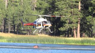 helicopter filling water bucket at white horse lake [upl. by Alleusnoc]