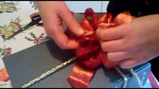 Come fare un fiocco regalo How to make a bow mp4 [upl. by Mather450]