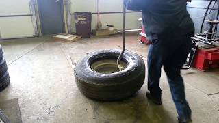 Dismounting a 31580R225 fire truck rear tire [upl. by Nekcarb189]