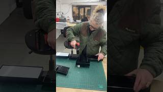 Screwing on a backplate to a laser aligner head tube wheelalignment automotive [upl. by Liebman]